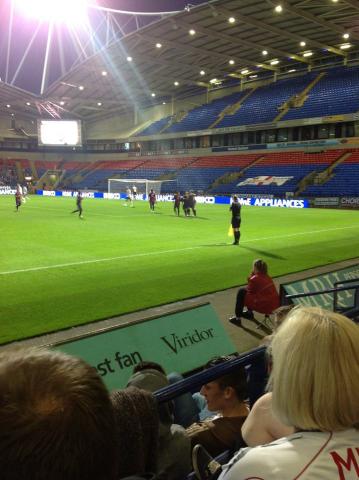 Penya Blaugrana London flag at the far end of the goal, supporting our players